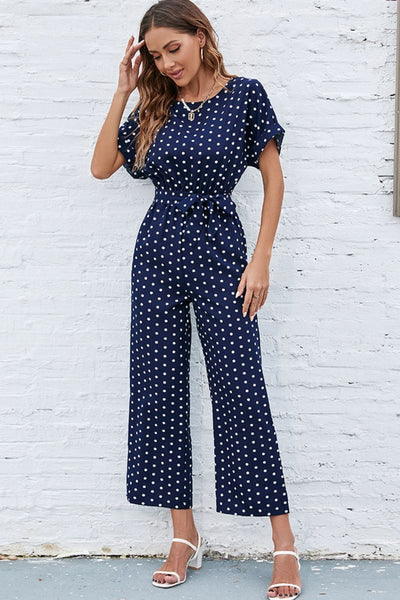 Polka Dot Tie Flare Leg Knee-Length Jumpsuit by Mississippi Hippie Co - Effortless Chic for Any Occasion! Navy / S